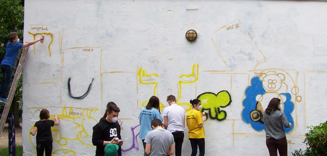 Graffitti-Wandgestaltung für Schüler des Pfefferwerks - Teambuilding mit Graffitti