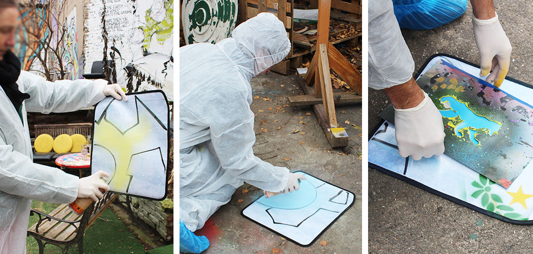 Graffiti Taschen werden bei Streetart Teambuilding Event mit Spraydosen gestaltet im YAAM Berlin